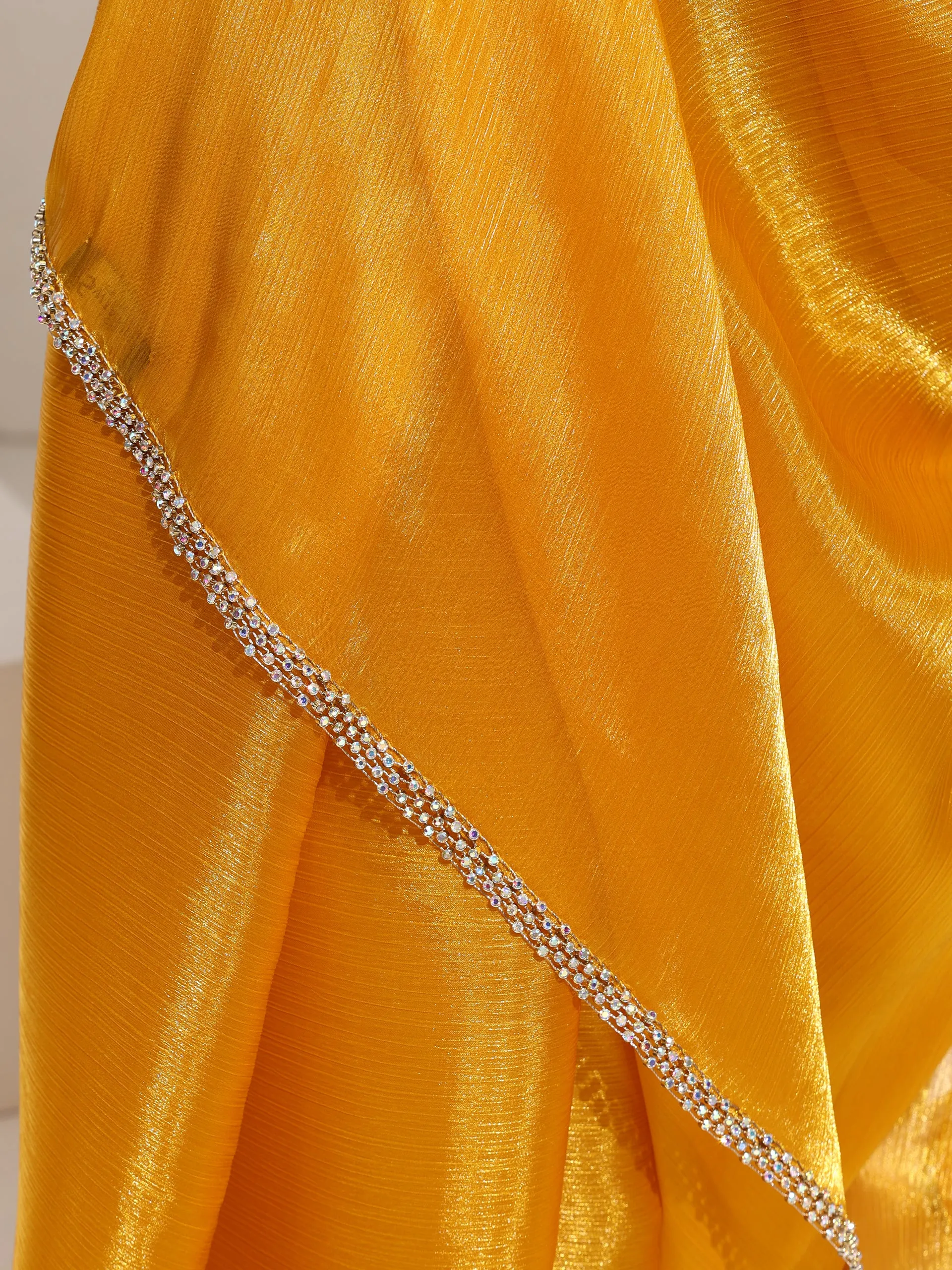 Sizzlin Saffron Organza Chiffon saree  with Rainbow Stone Lace and Self Blouse Fabric
